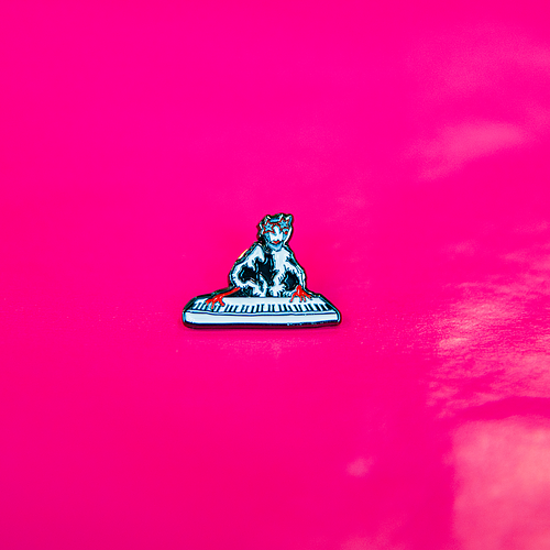 Shoebill pin on a pink background. 
