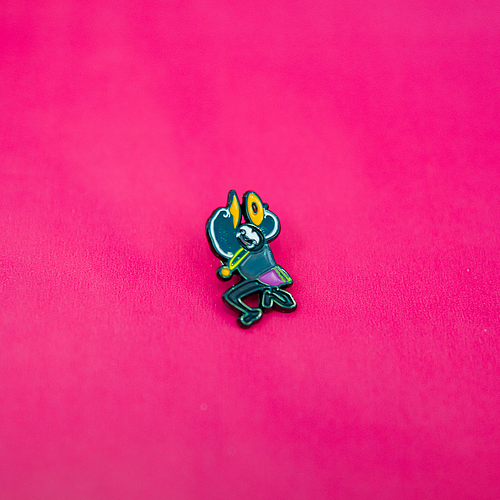 A sloth pin who is holding yellow cymbals and smiling. The pin sit on bright pink background. 